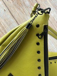 The Moss Renegade Handbag - Tassels, angles, rivets and a stunning colored synthetic leather