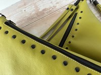 The Moss Renegade Handbag - Tassels, angles, rivets and a stunning colored synthetic leather