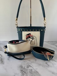 The Empowered Bucket Bag Set with Rosie vintage wartime icon inspired embroidery. Spacious, eye-catching, and designed for everyday style with attitude.