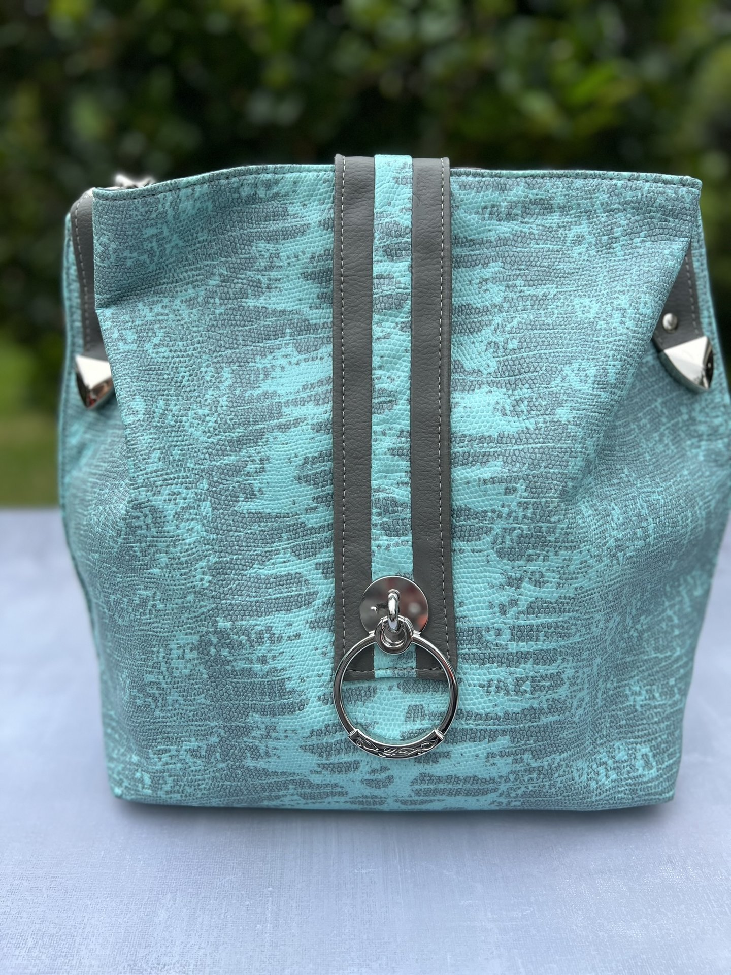 Turquoise Renegade - Western-Inspired Turquoise Faux Leather Handbag with Silver Hardware & Statement Ring Detail