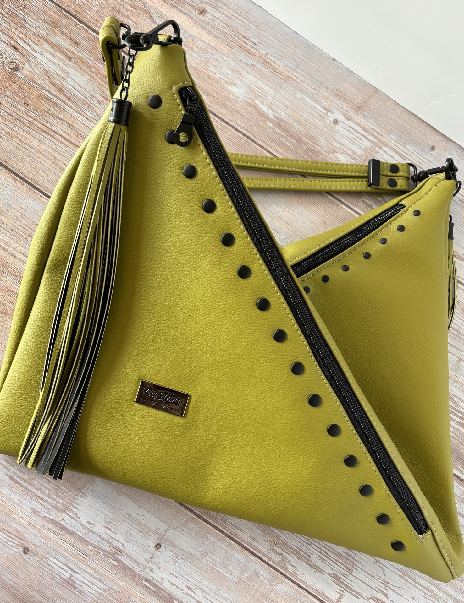 The Moss Renegade Handbag - Tassels, angles, rivets and a stunning colored synthetic leather