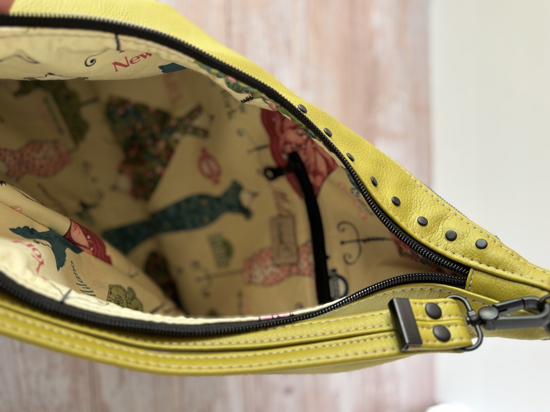 The Moss Renegade Handbag - Tassels, angles, rivets and a stunning colored synthetic leather