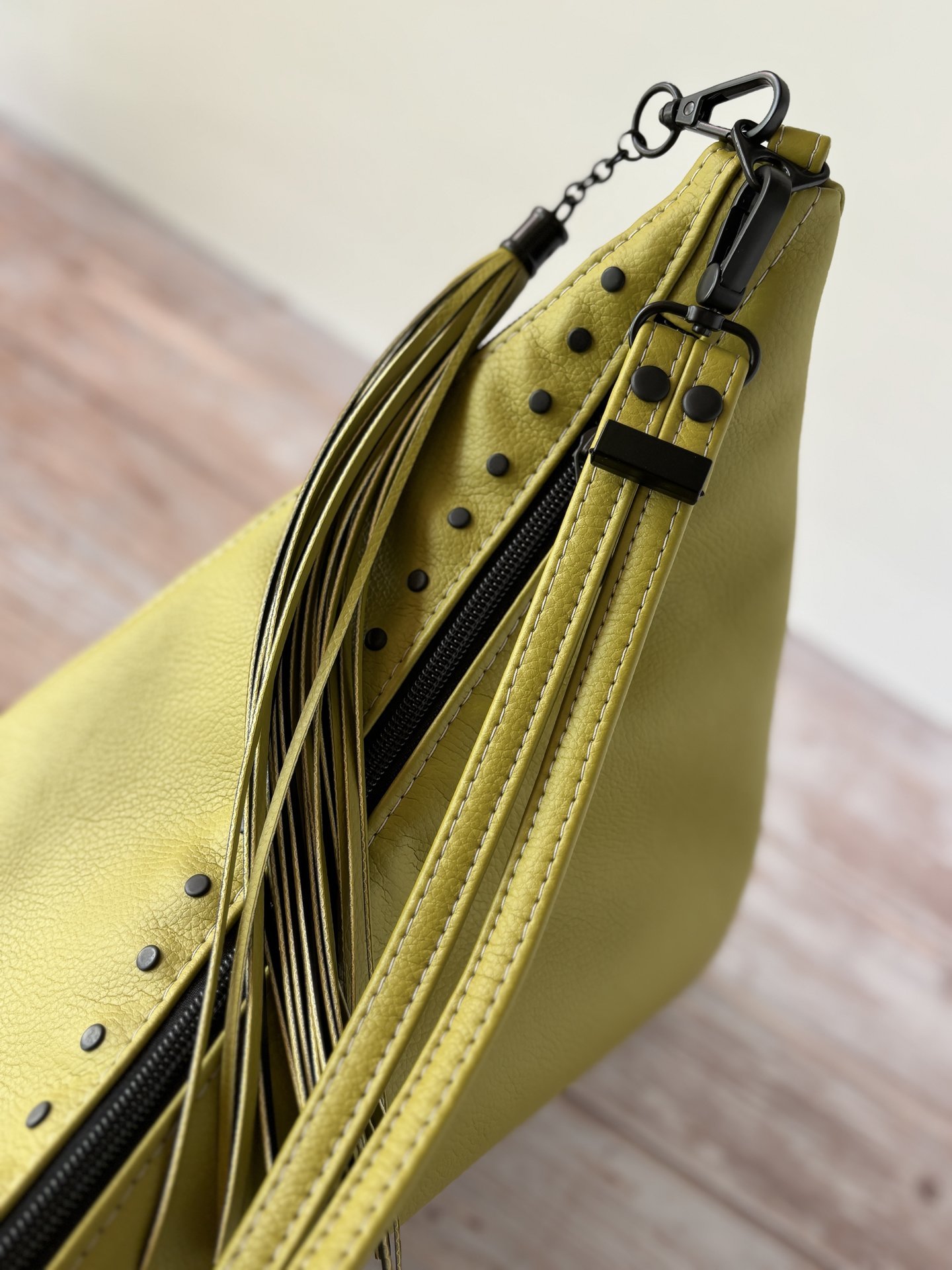 The Moss Renegade Handbag - Tassels, angles, rivets and a stunning colored synthetic leather