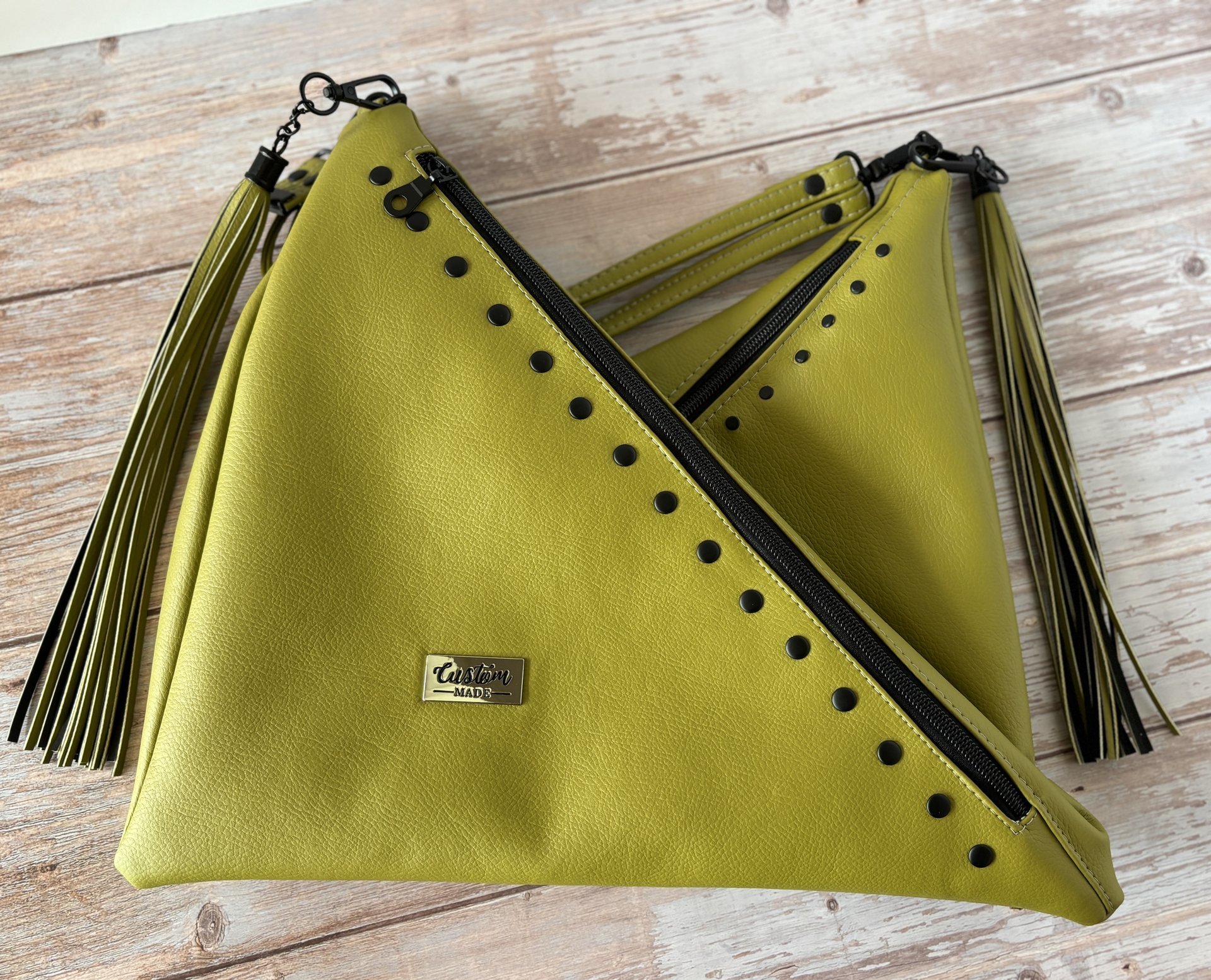 The Moss Renegade Handbag - Tassels, angles, rivets and a stunning colored synthetic leather