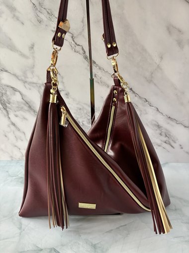 The Angler Slouchy Handbag - a rich, edgy, handbag with tassels + angled zipper giving it serious personality  - in a beautiful bordeaux faux leather